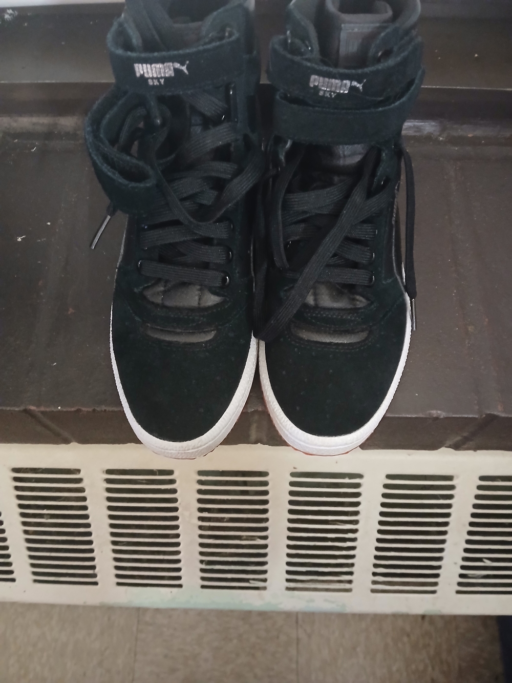 PUMA Black High-Top Sneakers with White Soles